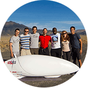Photo of Aerovelo team posing with Eta vehicle
